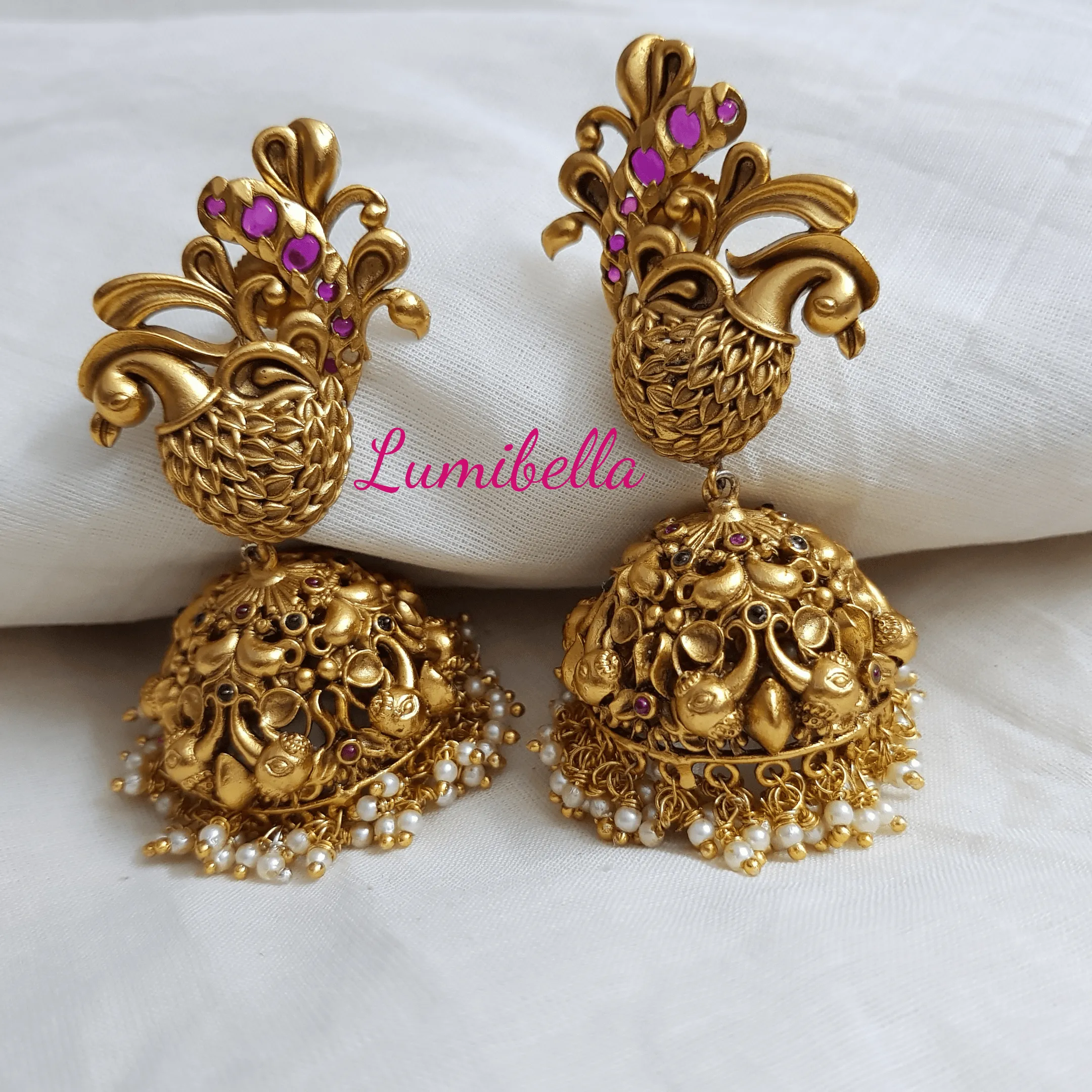 Golden Matte Peacock Jhumka Earrings with Ruby Stones