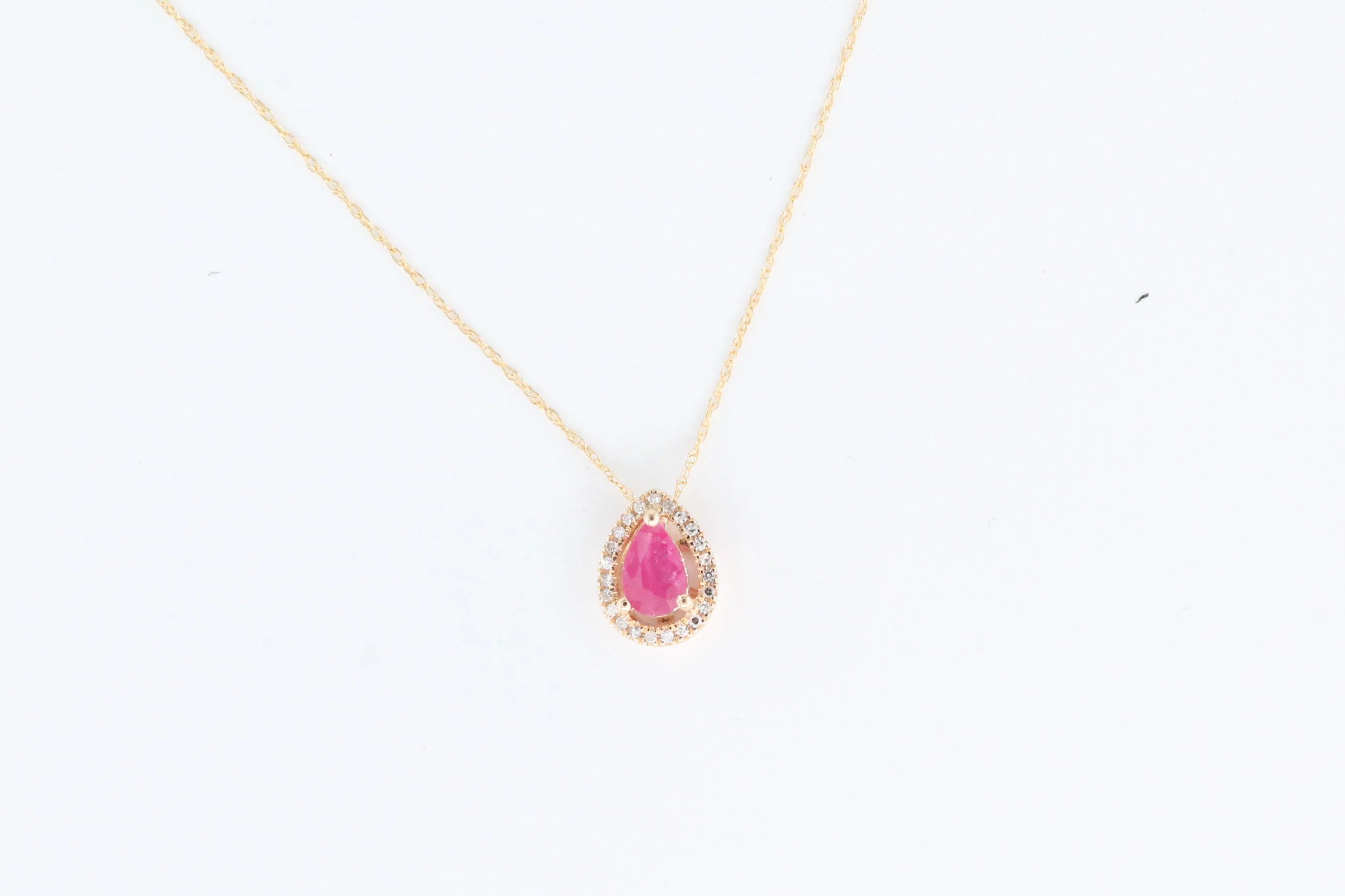 Yellow Gold Ruby and Diamond Floating Halo Pendant with Chain